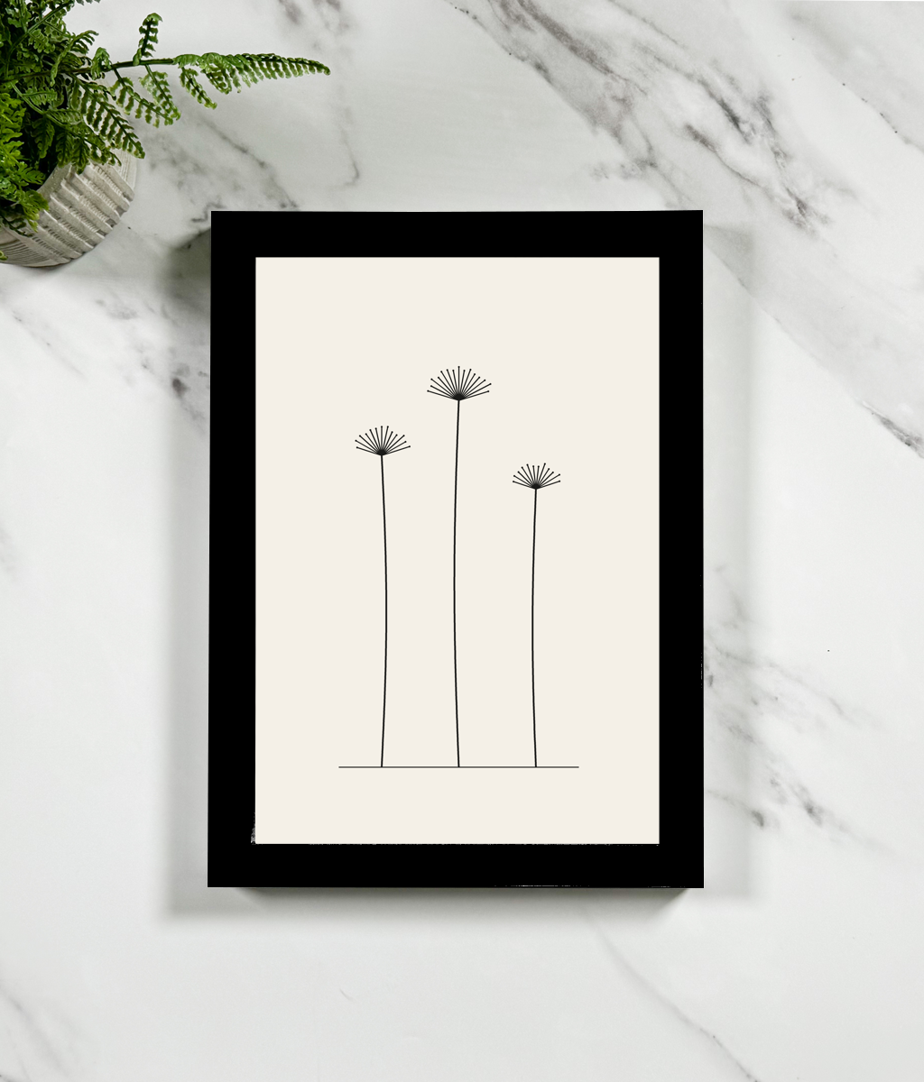 Dried Stems Framed Print, A3 black frame, on marble surface with fern